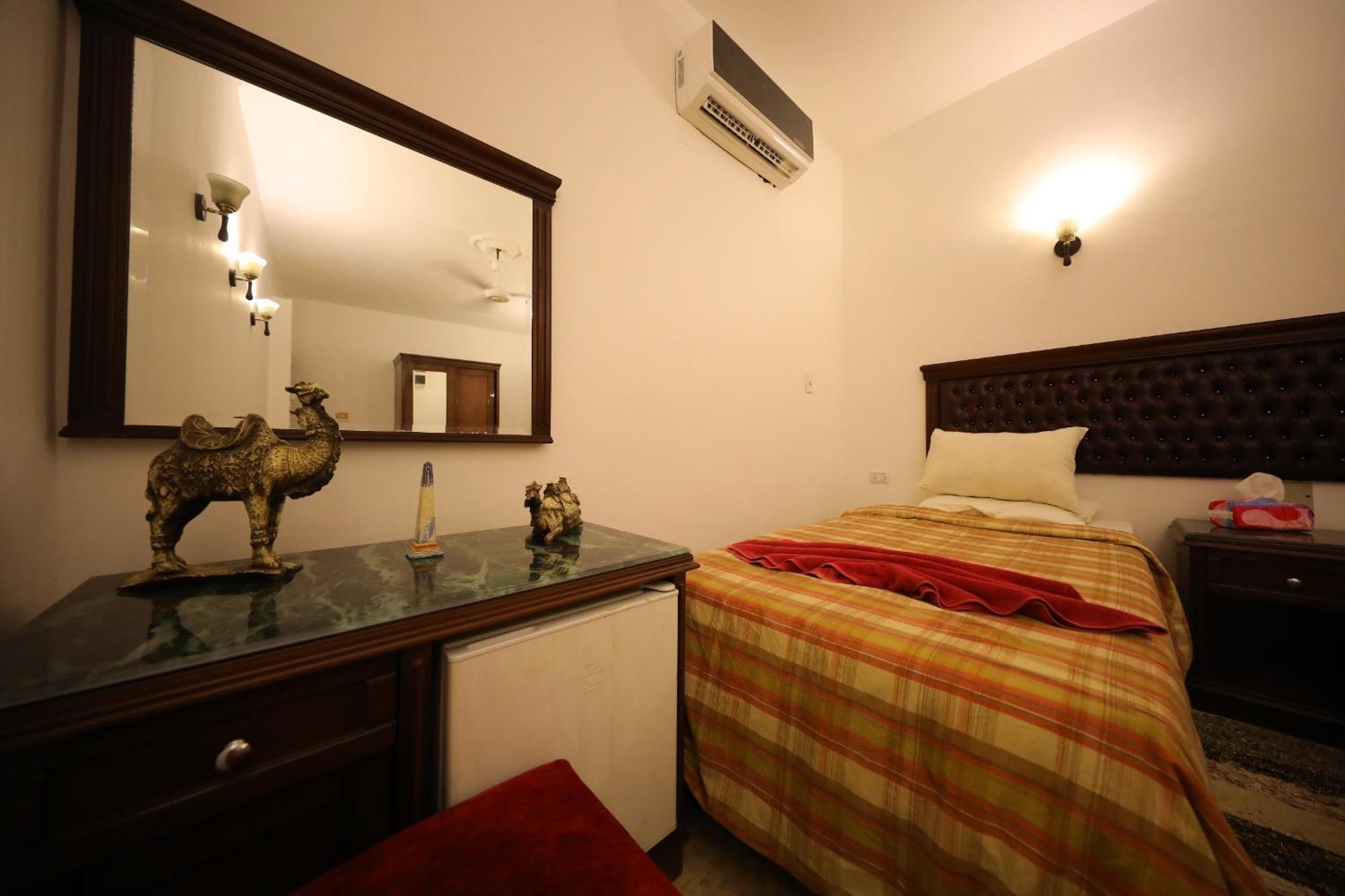 Pyramids Loft Guesthouse Kairó Szoba fotó
