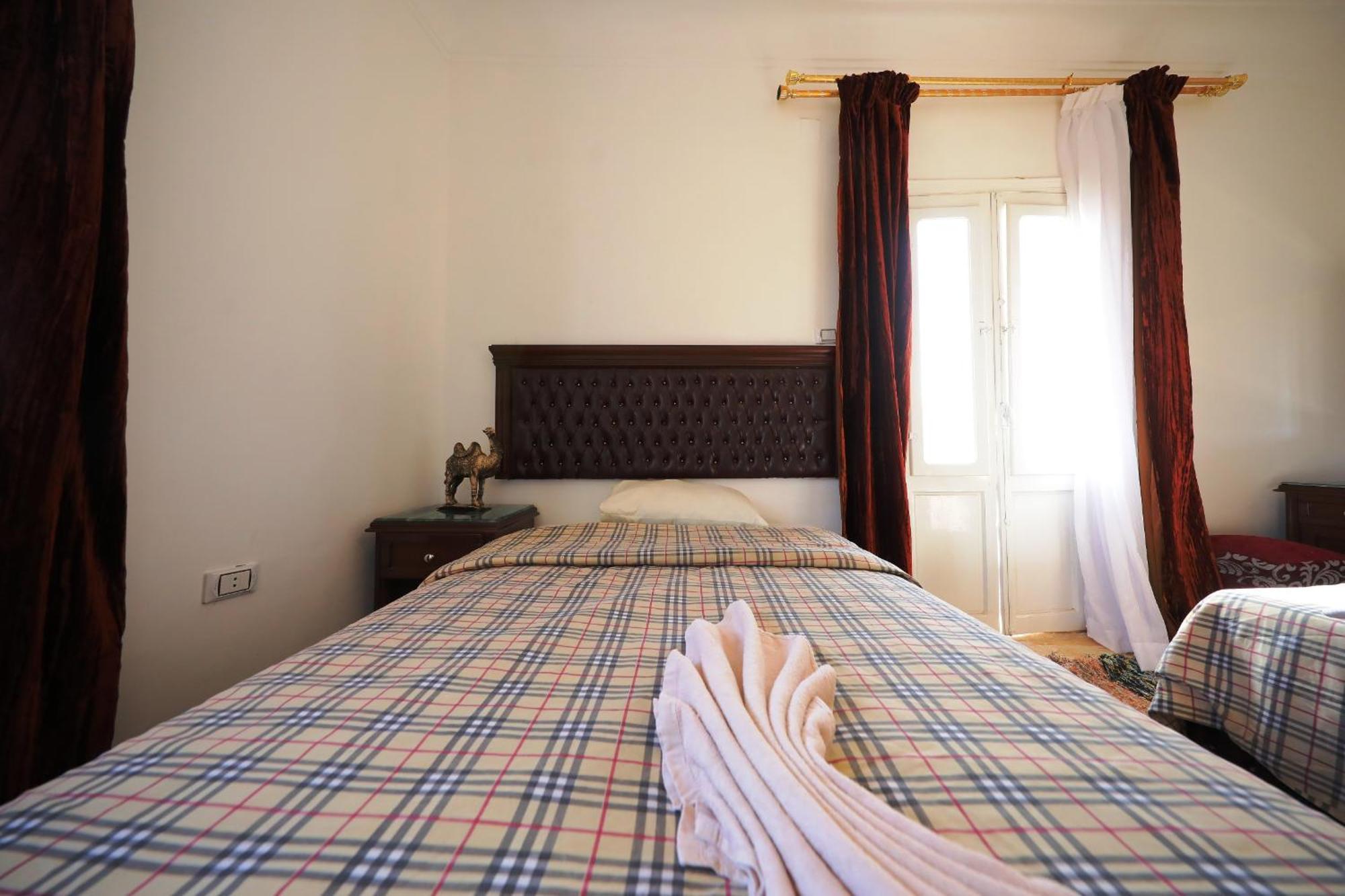 Pyramids Loft Guesthouse Kairó Szoba fotó